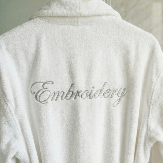 White robe with 'Embroidery' text on a neutral background